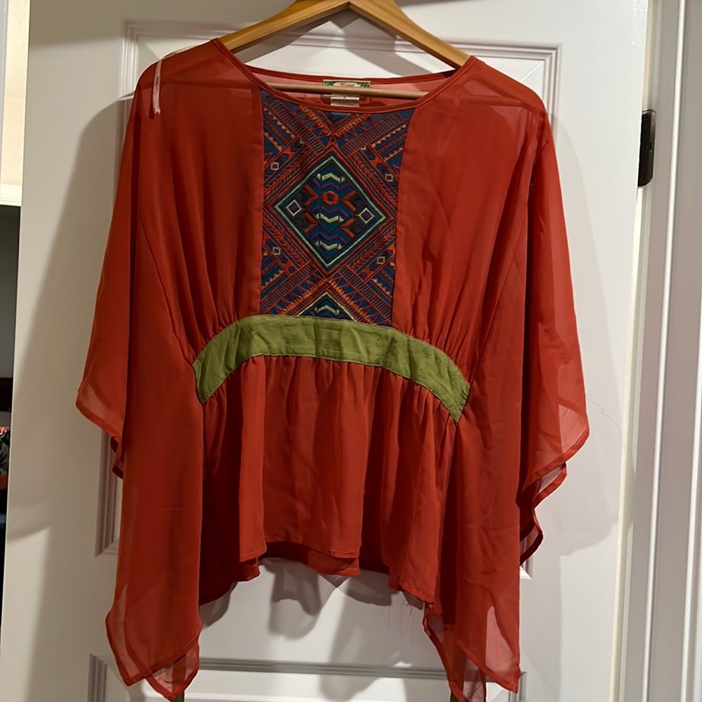 Flying tomato top